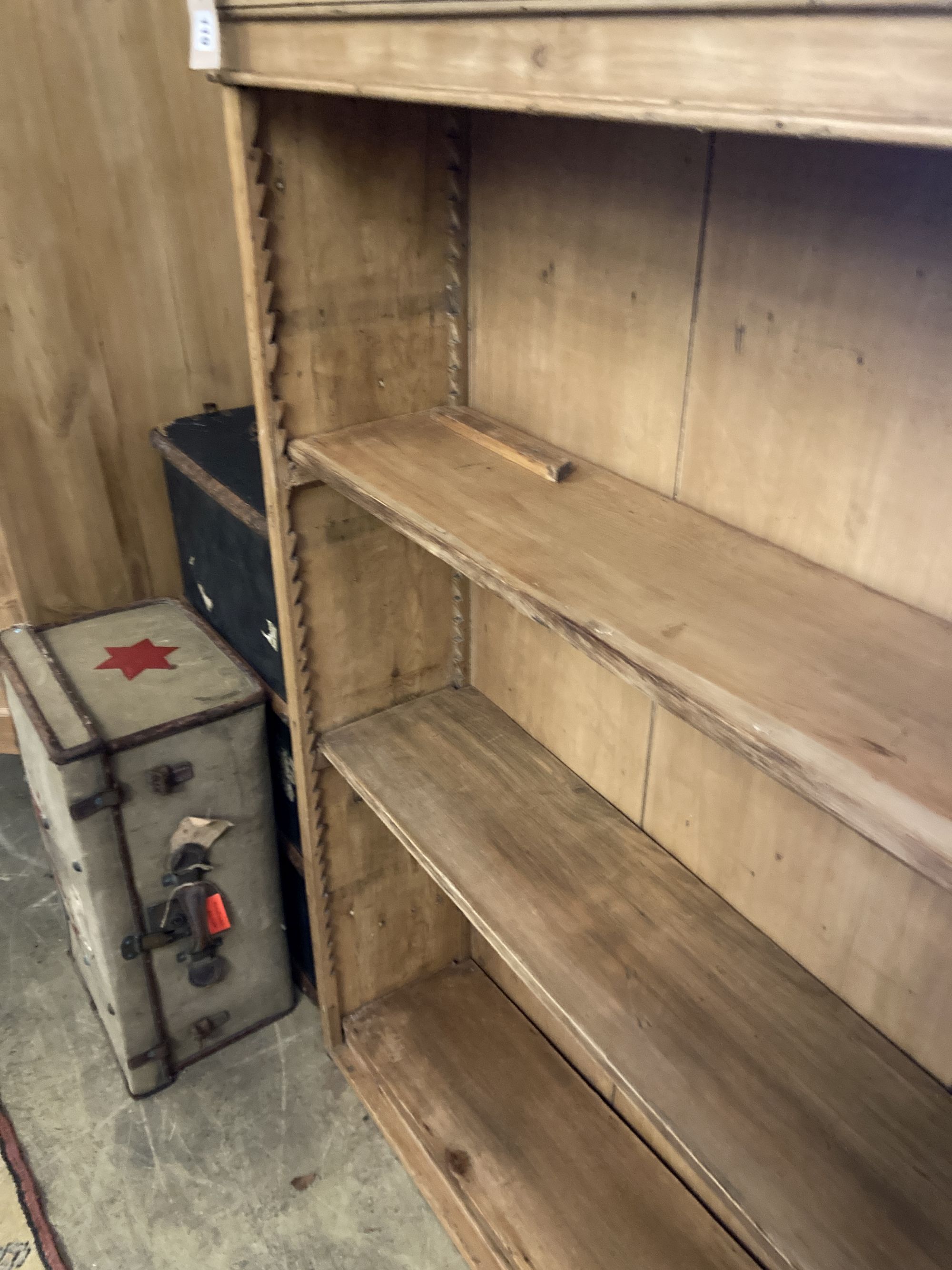 A Victorian pine open bookcase, width 108cm, depth 31cm, height 152cm